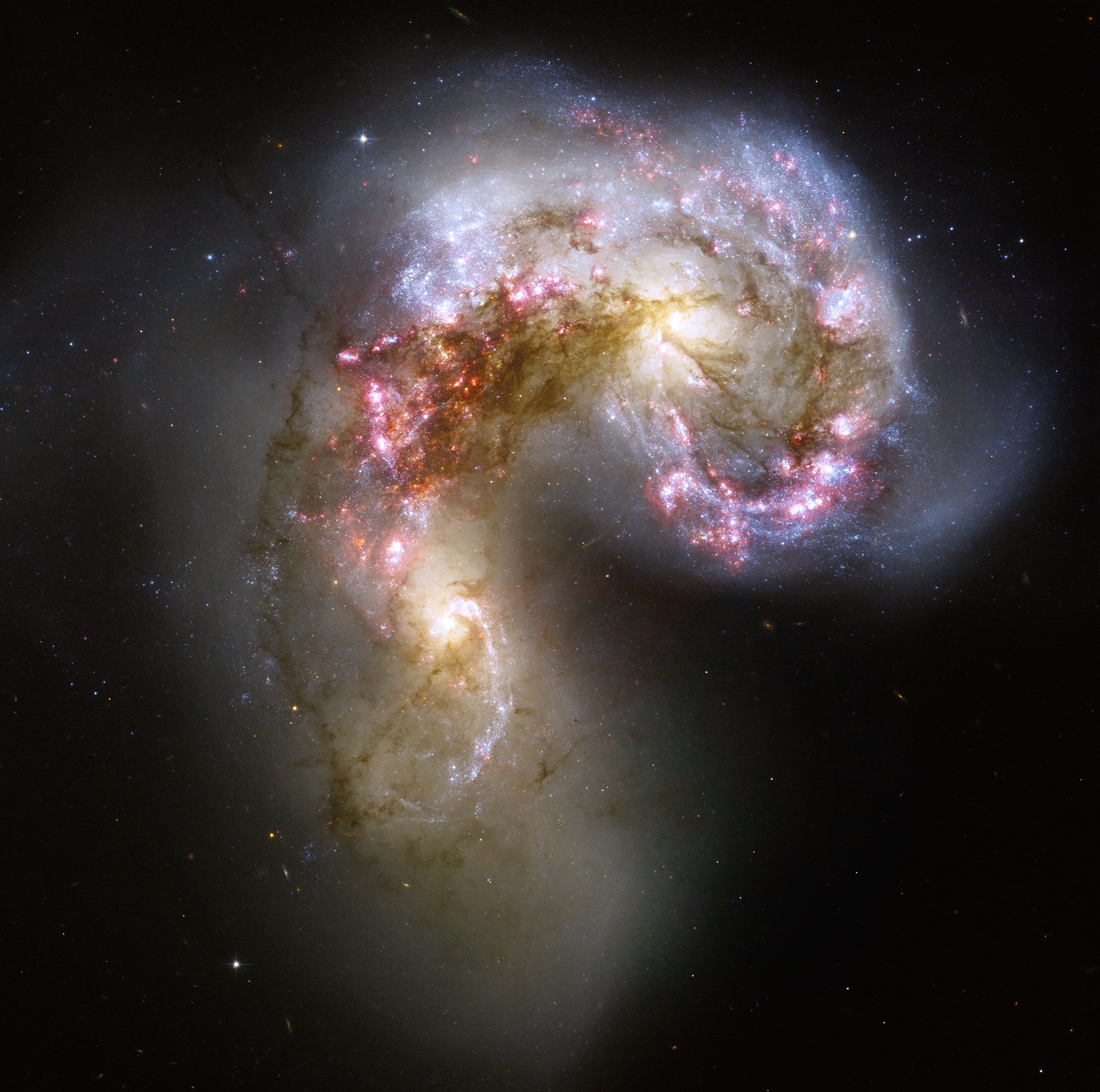 <span style="font-size:16px;position:relative;top:-50px">[NASA/ESA](https://commons.wikimedia.org/wiki/File:Antennae_galaxies_xl.jpg)</span>