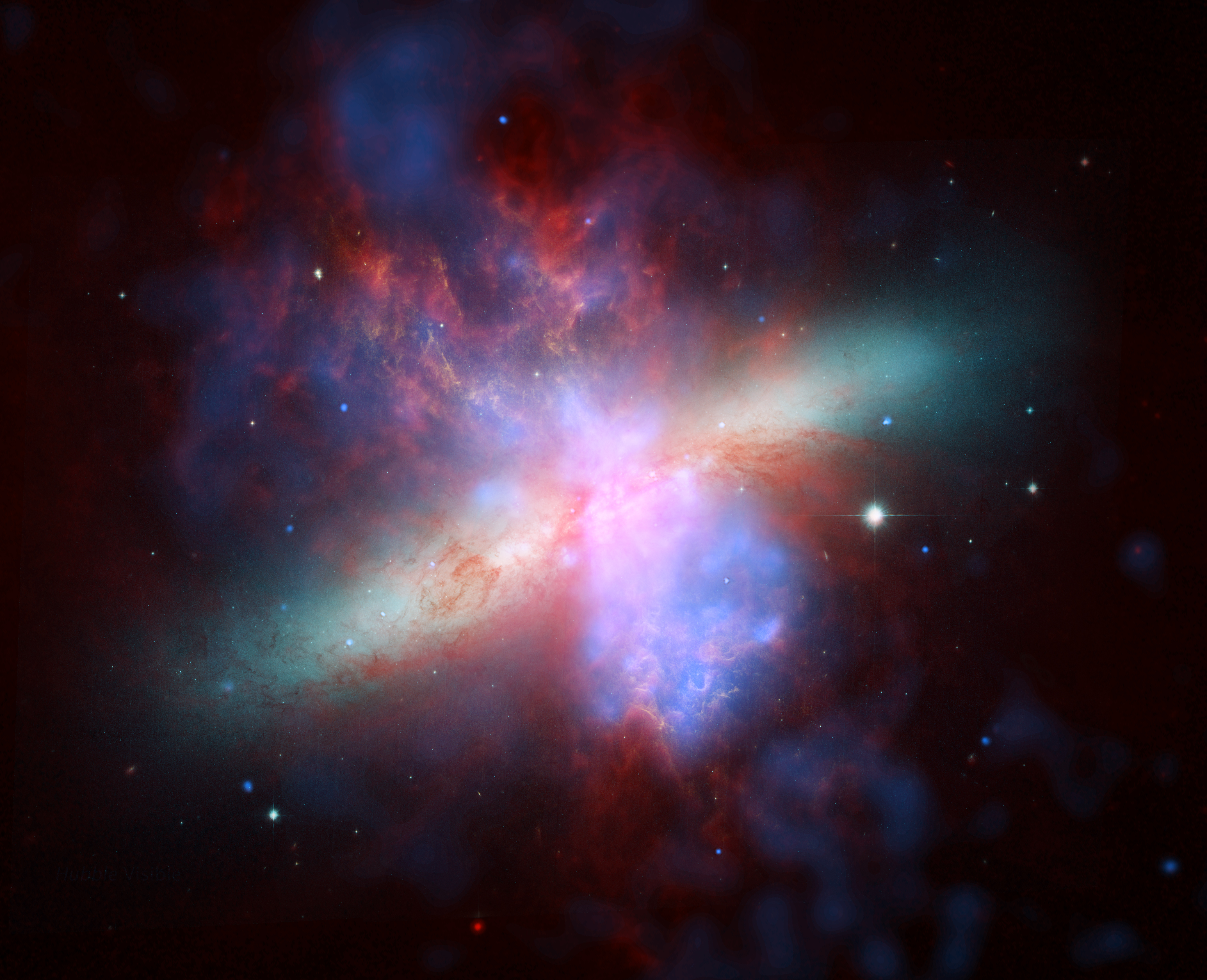 <span style="font-size:16px;position:relative;top:-60px">[NASA/JPL-Caltech/STScI/CXC/UofA/ESA/AURA/JHU](http://www.spitzer.caltech.edu/images/2205-sig06-010-M82-Great-Observatories-Present-Rainbow-of-a-Galaxy)</span>